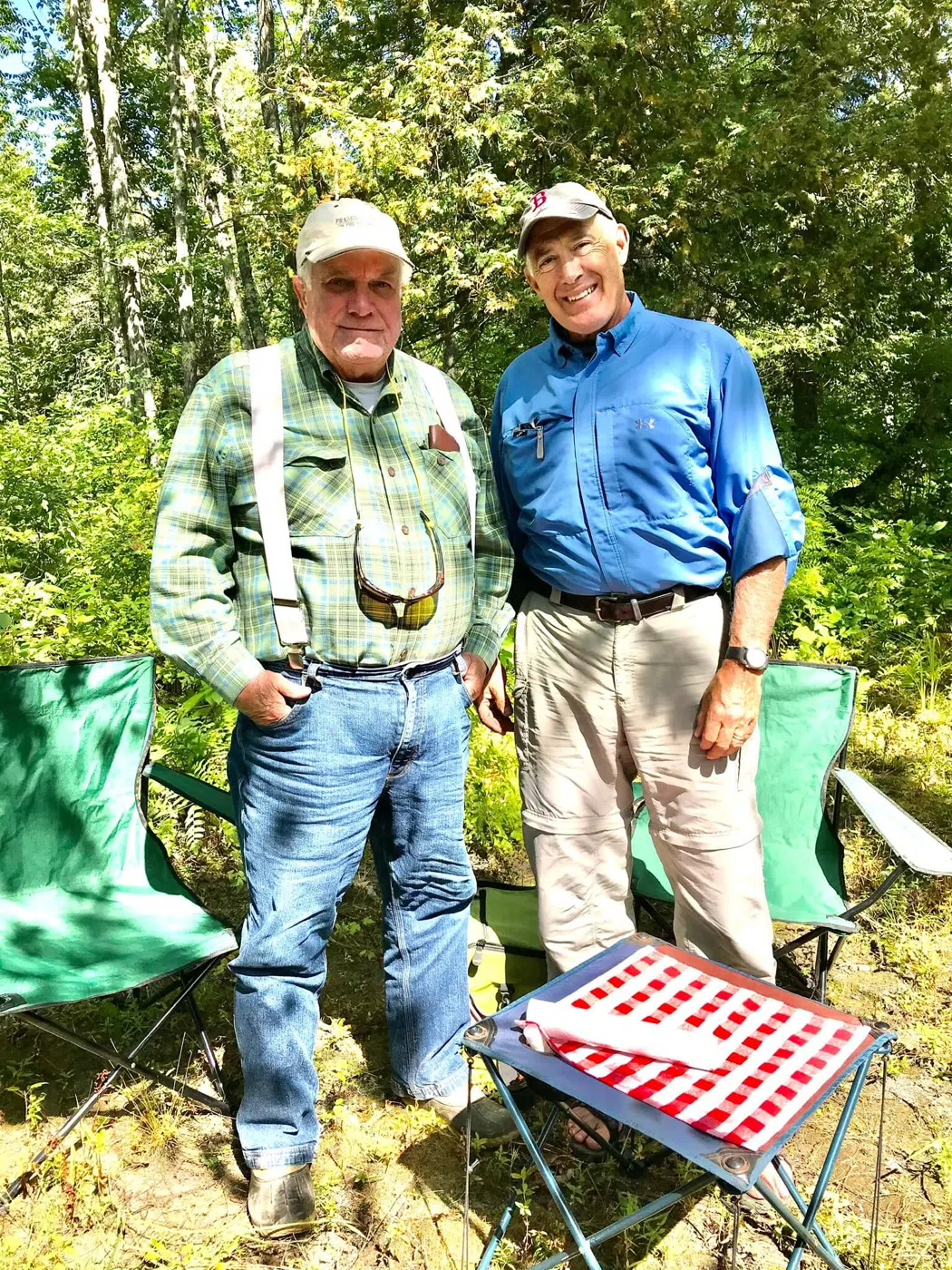Clients enjoying shore lunch during a guided Maine trip