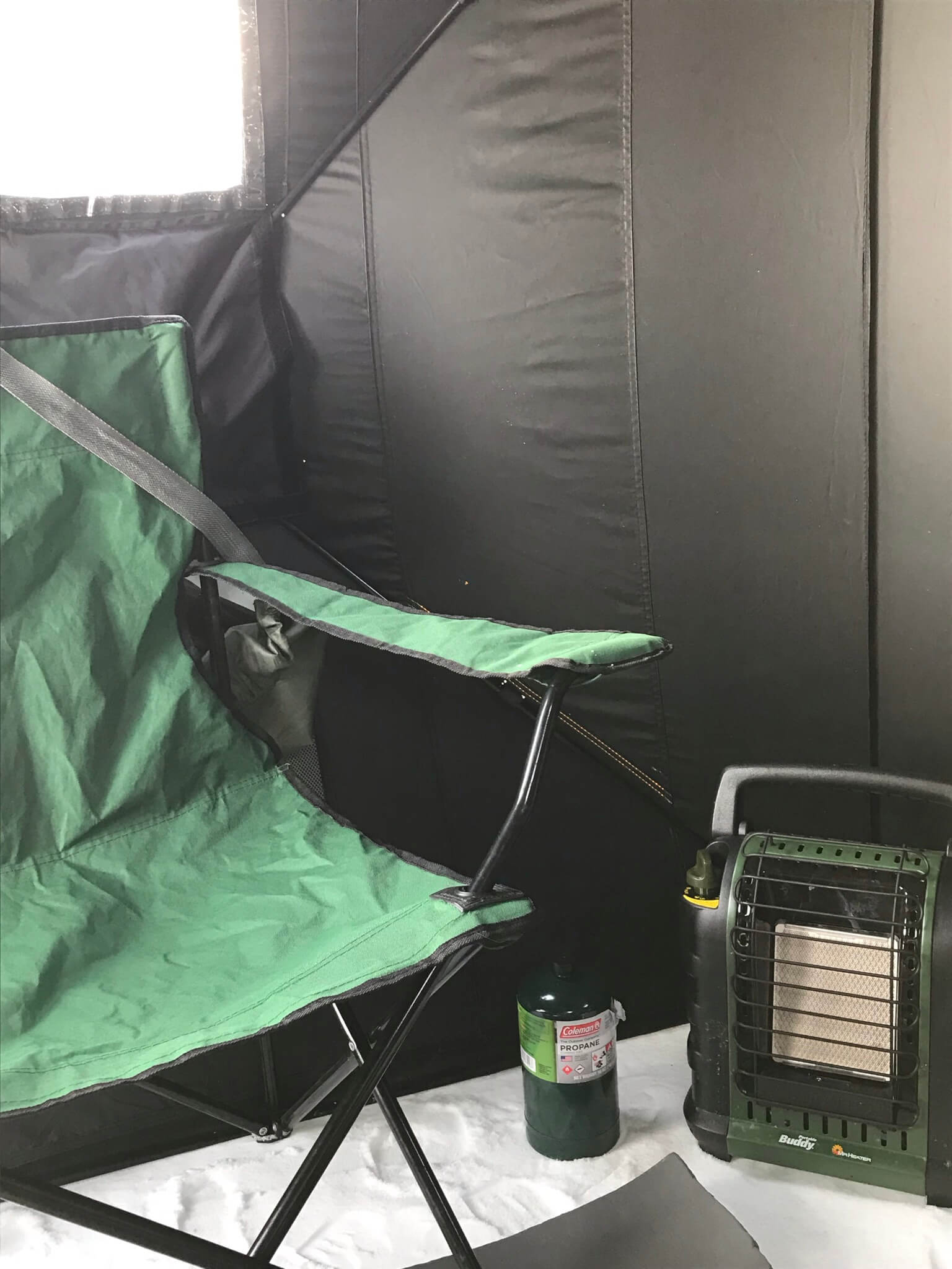 Inside ice shack and heater