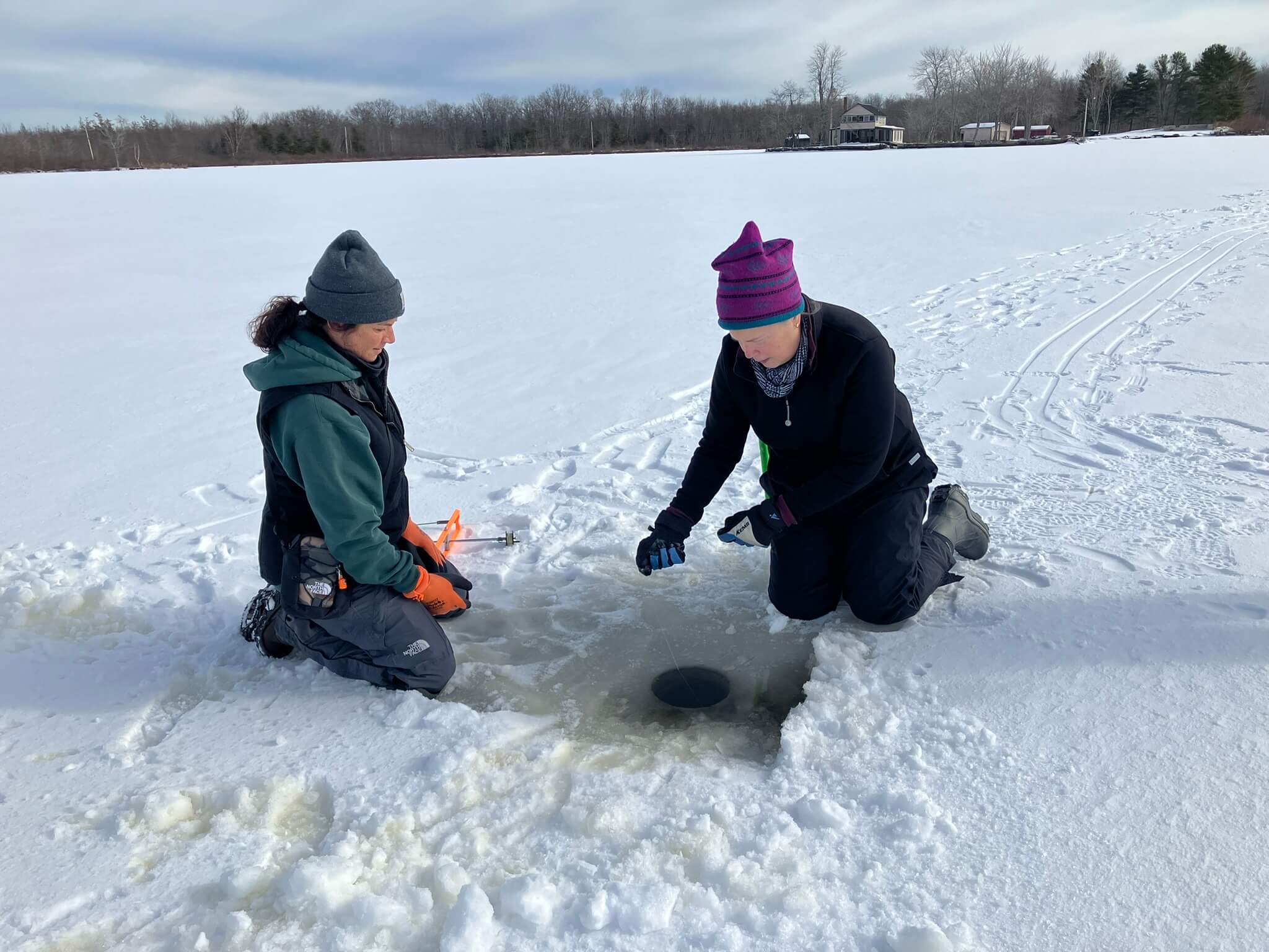 Playing a fish through the ice